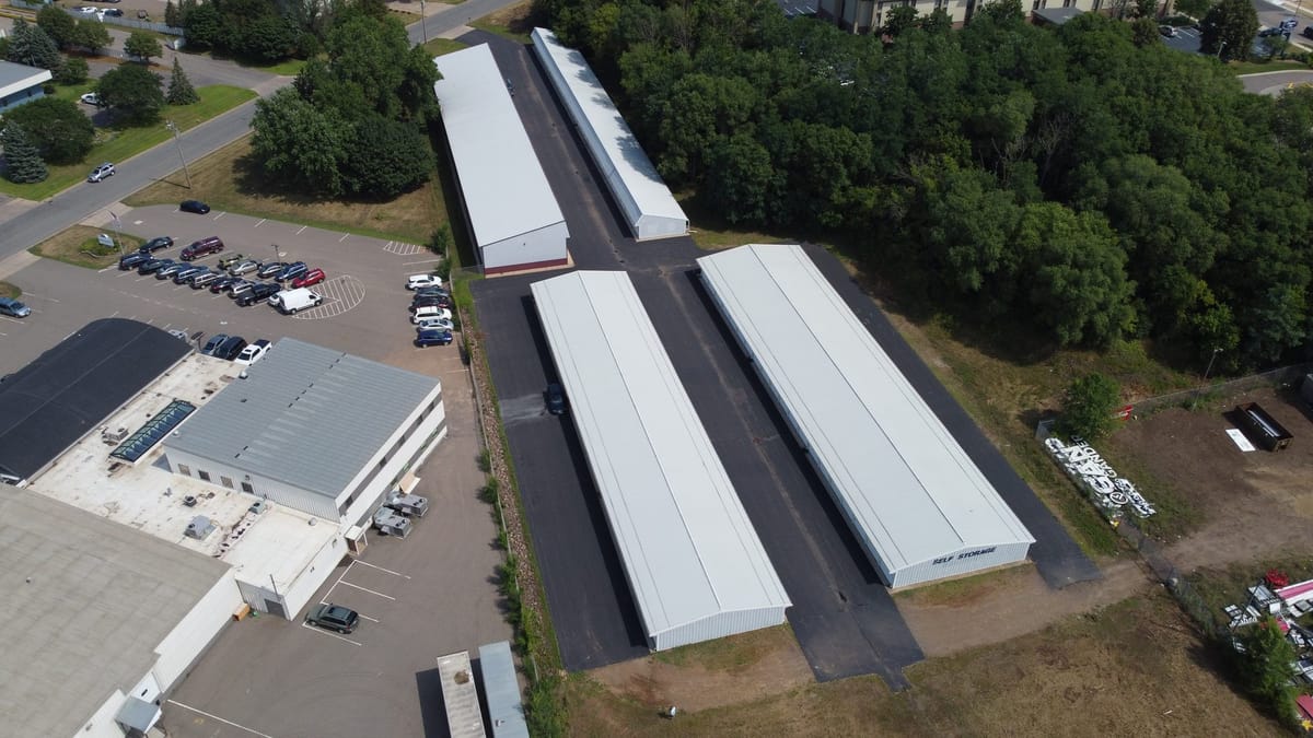 Aerial view of a Droit self-storage facility at dusk